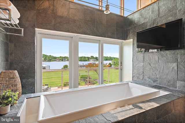 22 E Lake Dr, Annapolis, MD 21403 - full bathroom featuring a bath and a towering ceiling