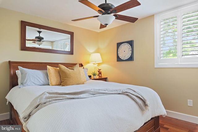 22 E Lake Dr, Annapolis, MD 21403 - bedroom with wood finished floors, baseboards, and a ceiling fan