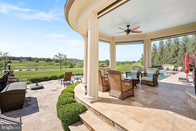 22701 Creighton Farms Dr, Leesburg, VA 20175 - view of patio / terrace with ceiling fan, an outdoor pool, outdoor lounge area, and a water view