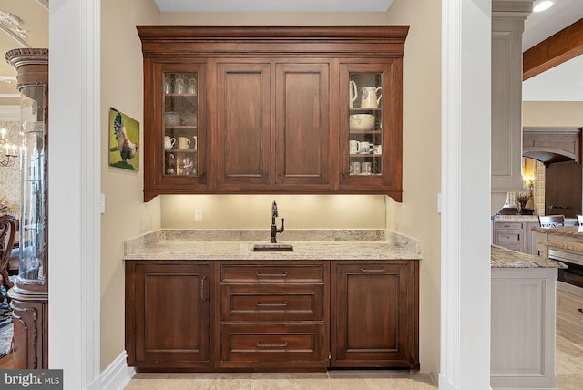 22701 Creighton Farms Dr, Leesburg, VA 20175 - bar area with a sink, a warming drawer, and arched walkways