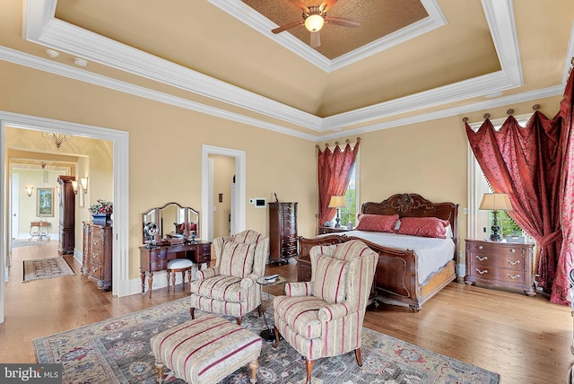 22701 Creighton Farms Dr, Leesburg, VA 20175 - bedroom with a raised ceiling, wood finished floors, and crown molding