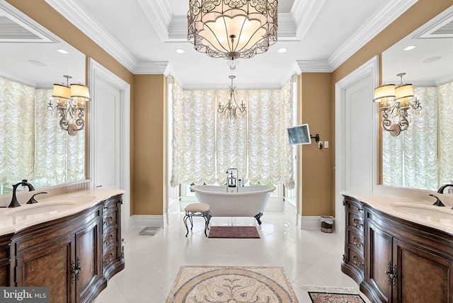 22701 Creighton Farms Dr, Leesburg, VA 20175 - full bathroom featuring a chandelier, two vanities, baseboards, a soaking tub, and crown molding