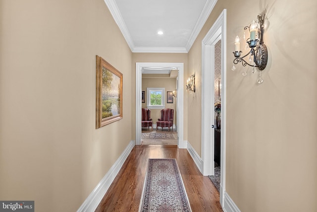 22701 Creighton Farms Dr, Leesburg, VA 20175 - hall with wood finished floors, crown molding, baseboards, and a chandelier