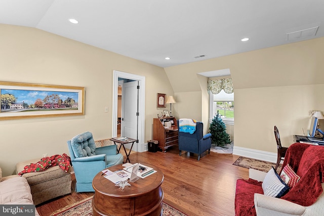 22701 Creighton Farms Dr, Leesburg, VA 20175 - living area featuring wood finished floors, lofted ceiling, recessed lighting, and baseboards