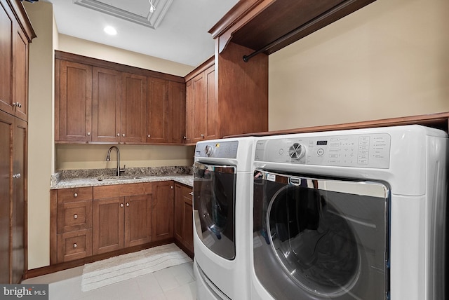 22701 Creighton Farms Dr, Leesburg, VA 20175 - laundry room with separate washer and dryer, cabinet space, light tile patterned floors, and recessed lighting