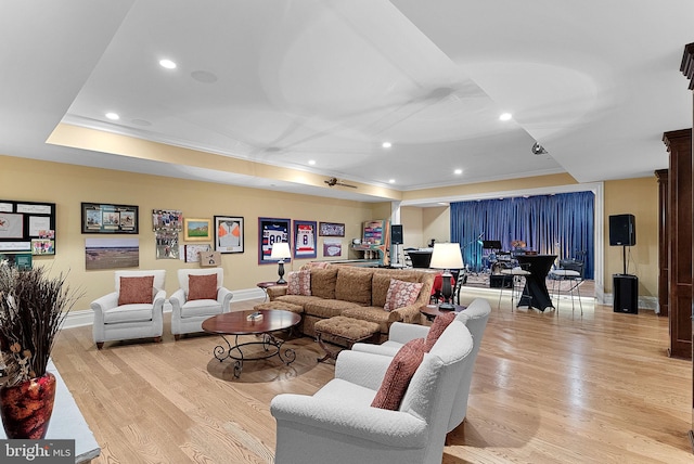 22701 Creighton Farms Dr, Leesburg, VA 20175 - living area with light wood finished floors, baseboards, a tray ceiling, recessed lighting, and ornamental molding