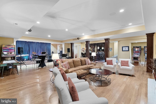 22701 Creighton Farms Dr, Leesburg, VA 20175 - living room with decorative columns, crown molding, light wood-type flooring, and recessed lighting