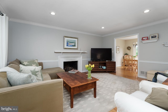 100 Weldon Way, Pennington, NJ 08534 - living room with light wood finished floors, crown molding, recessed lighting, and a fireplace