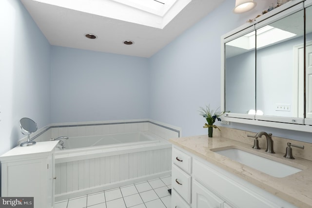 100 Weldon Way, Pennington, NJ 08534 - full bathroom with a skylight, vanity, a garden tub, and tile patterned flooring