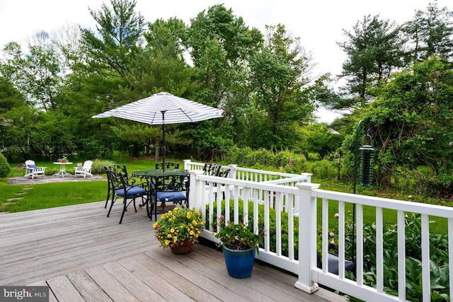 100 Weldon Way, Pennington, NJ 08534 - wooden deck featuring outdoor dining space, a yard, and view of scattered trees