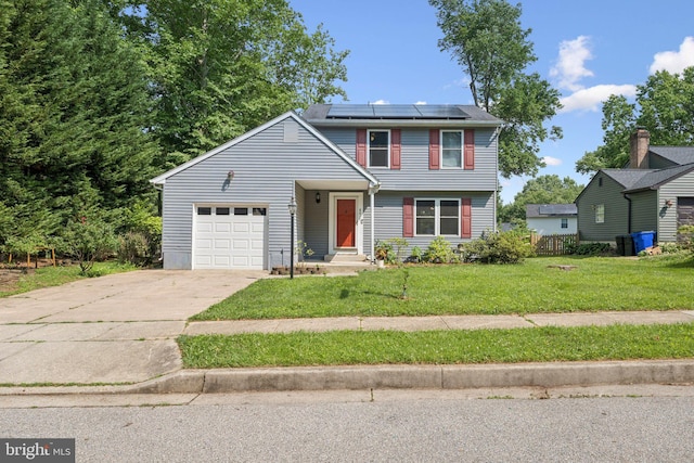 8017 Cipher Row, Jessup, MD 20794 - view of front facade with an attached garage, driveway, and solar panels
