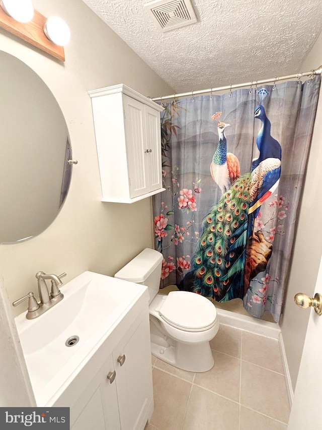8017 Cipher Row, Jessup, MD 20794 - bathroom featuring vanity, a textured ceiling, tile patterned flooring, and a shower with curtain