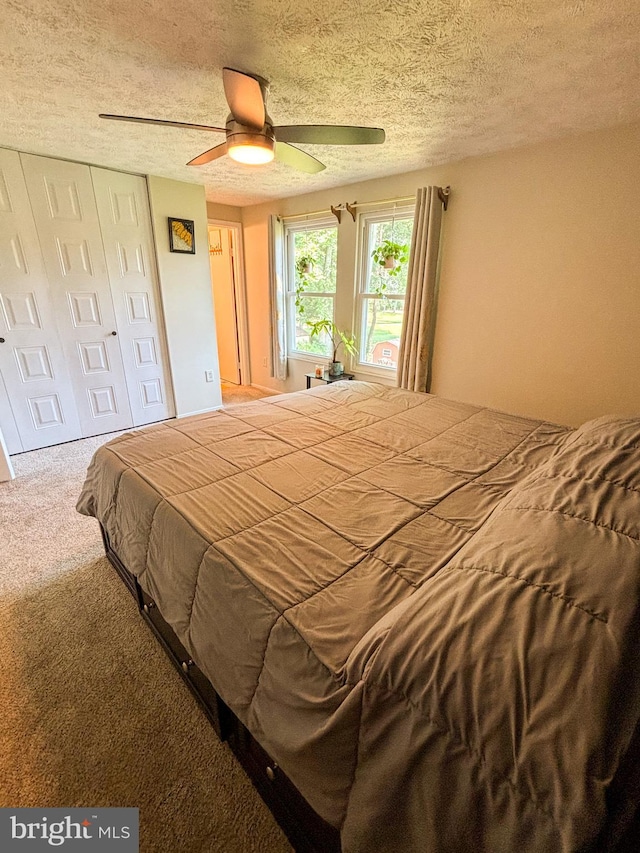 8017 Cipher Row, Jessup, MD 20794 - bedroom featuring carpet, a textured ceiling, ceiling fan, and a closet