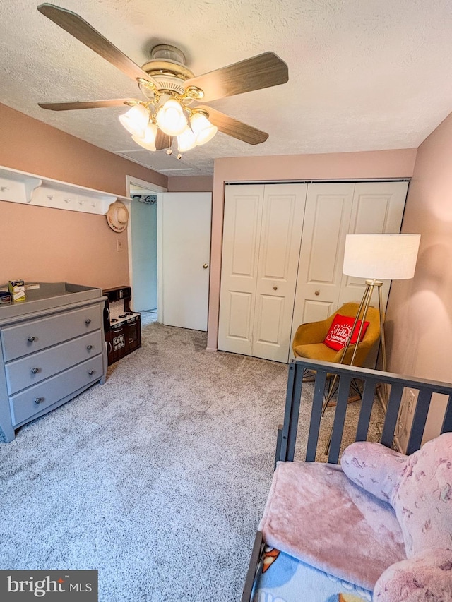 8017 Cipher Row, Jessup, MD 20794 - carpeted bedroom featuring a textured ceiling, a closet, and ceiling fan