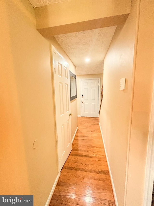8017 Cipher Row, Jessup, MD 20794 - corridor with a textured ceiling and light wood-style floors