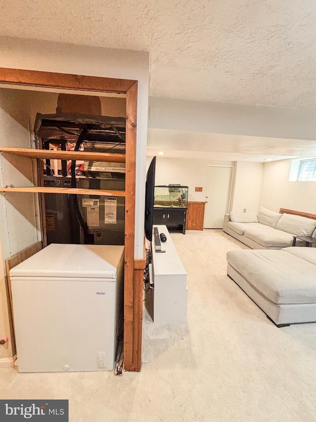 8017 Cipher Row, Jessup, MD 20794 - below grade area featuring fridge, carpet flooring, and a textured ceiling