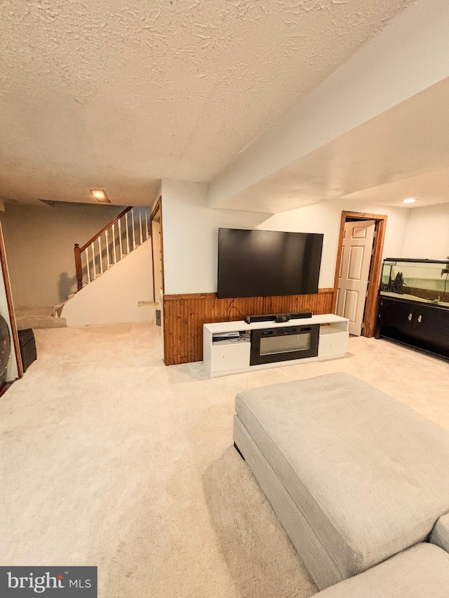 8017 Cipher Row, Jessup, MD 20794 - living room with carpet floors, a textured ceiling, and stairs