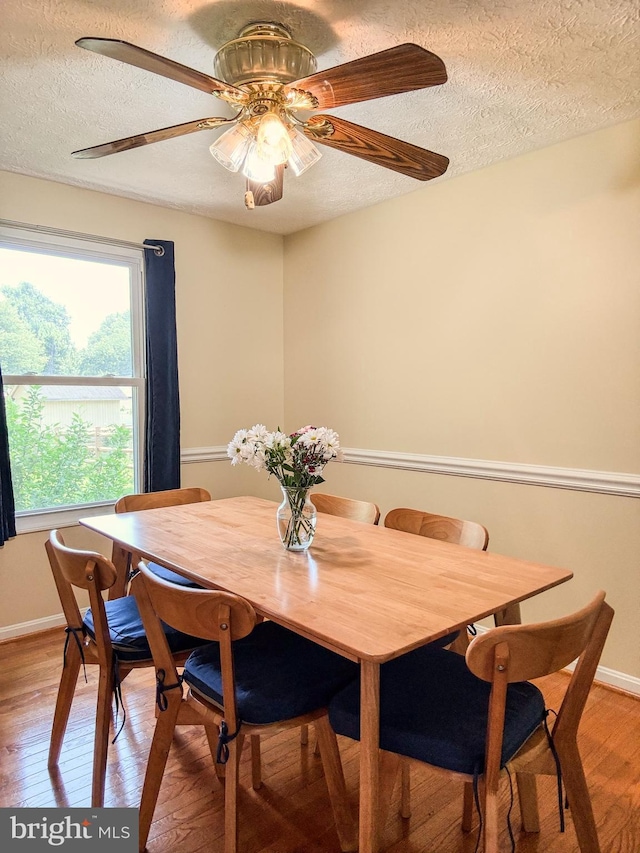 8017 Cipher Row, Jessup, MD 20794 - dining room featuring light wood-type flooring, a textured ceiling, and ceiling fan
