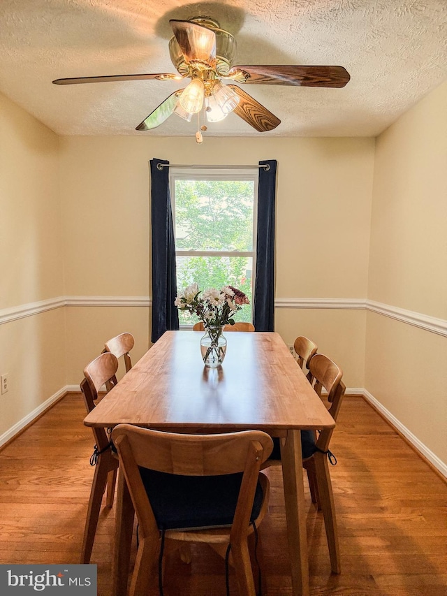 8017 Cipher Row, Jessup, MD 20794 - dining space featuring a textured ceiling, ceiling fan, and wood finished floors