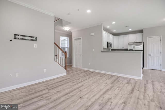 43415 Madison Renee Ter Unit 120, Ashburn, VA 20147 - unfurnished living room with ornamental molding, stairway, baseboards, light wood-style flooring, and recessed lighting