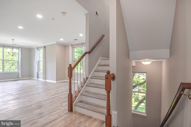 43415 Madison Renee Ter Unit 120, Ashburn, VA 20147 - stairway with wood finished floors, baseboards, recessed lighting, plenty of natural light, and ornamental molding