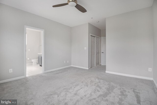 43415 Madison Renee Ter Unit 120, Ashburn, VA 20147 - unfurnished bedroom with carpet, a closet, baseboards, and ensuite bath