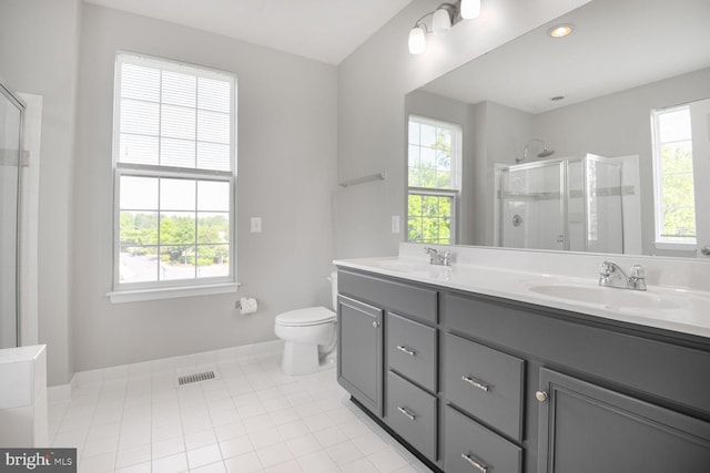 43415 Madison Renee Ter Unit 120, Ashburn, VA 20147 - full bathroom featuring double vanity, a shower stall, and plenty of natural light