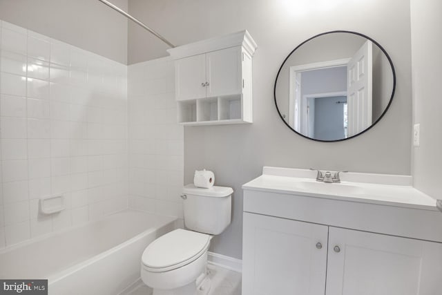 43415 Madison Renee Ter Unit 120, Ashburn, VA 20147 - bathroom featuring vanity, toilet, baseboards, and shower / tub combination