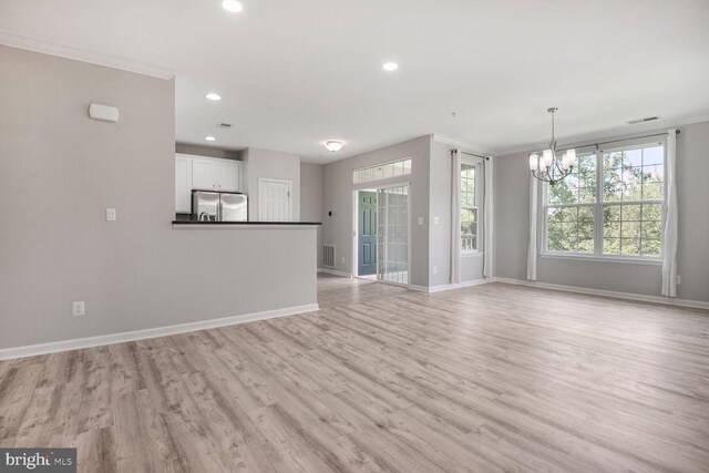 43415 Madison Renee Ter Unit 120, Ashburn, VA 20147 - unfurnished living room with crown molding, a chandelier, recessed lighting, light wood-style flooring, and baseboards