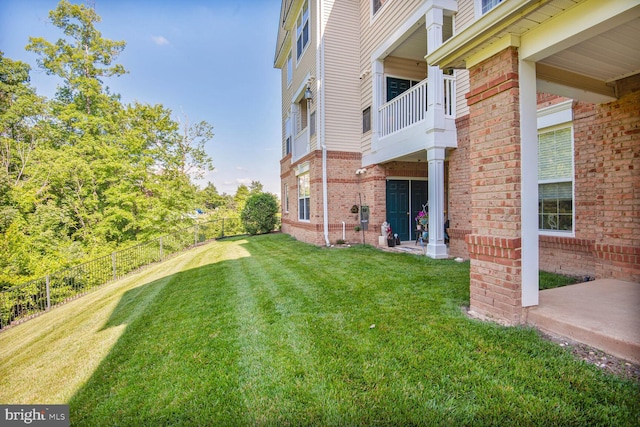 43415 Madison Renee Ter Unit 120, Ashburn, VA 20147 - view of yard with a balcony