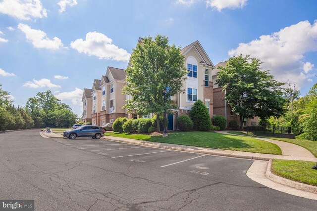 43415 Madison Renee Ter Unit 120, Ashburn, VA 20147 - view of property with uncovered parking