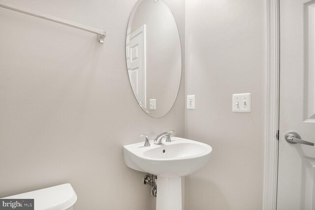 43415 Madison Renee Ter Unit 120, Ashburn, VA 20147 - half bath featuring toilet and a sink