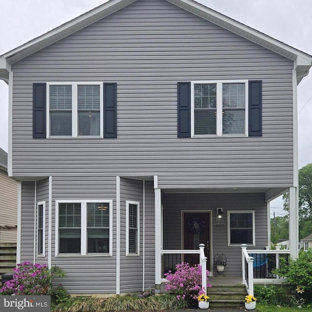 4001 7th St, North Beach, MD 20714 - view of front facade with a porch