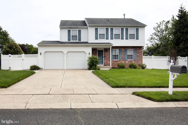 36 Covington Dr, Sicklerville, NJ 08081 - view of front facade featuring driveway, brick siding, a gate, and an attached garage