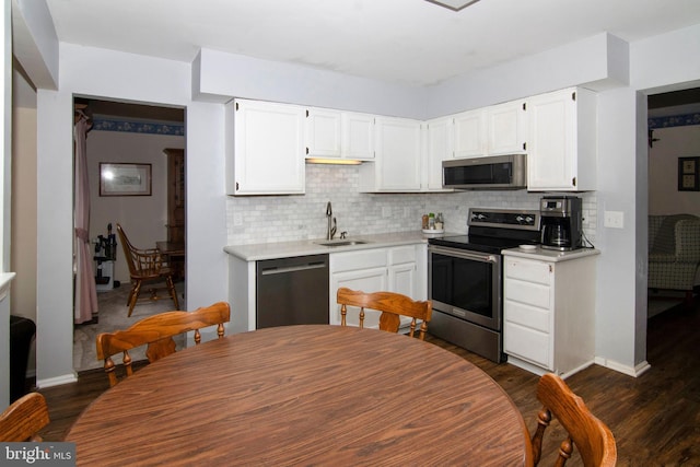 36 Covington Dr, Sicklerville, NJ 08081 - kitchen featuring appliances with stainless steel finishes, backsplash, light countertops, and white cabinets
