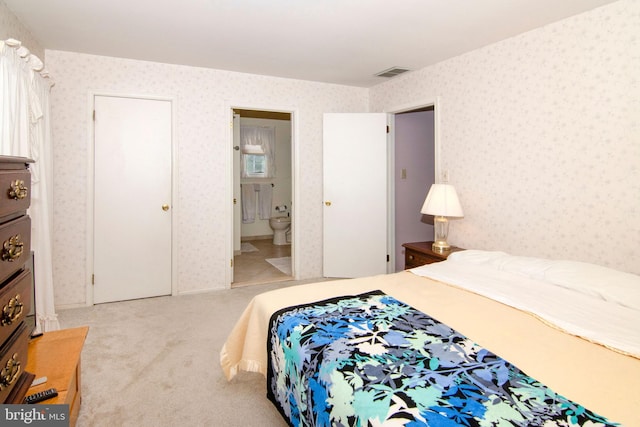 36 Covington Dr, Sicklerville, NJ 08081 - carpeted bedroom with wallpapered walls and ensuite bath