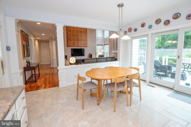 32 Eagleton Farm Rd, Newtown, PA 18940 - dining space with decorative columns, recessed lighting, and light stone finish floors