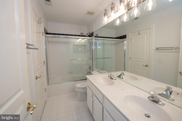32 Eagleton Farm Rd, Newtown, PA 18940 - full bath with tile patterned floors, combined bath / shower with glass door, double vanity, and toilet