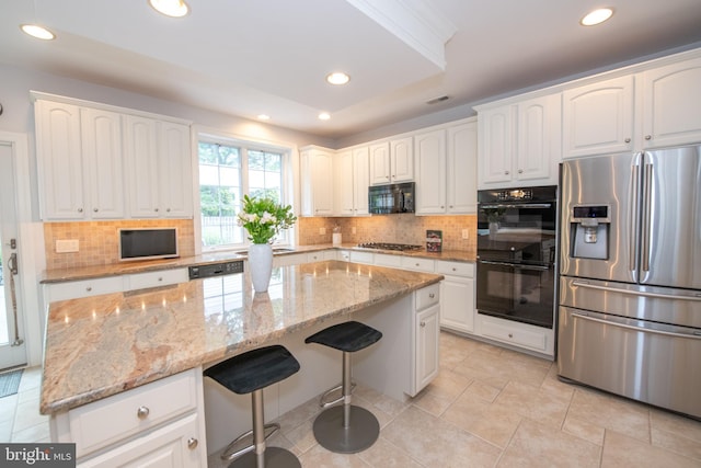 32 Eagleton Farm Rd, Newtown, PA 18940 - kitchen featuring black appliances, recessed lighting, decorative backsplash, a center island, and white cabinetry