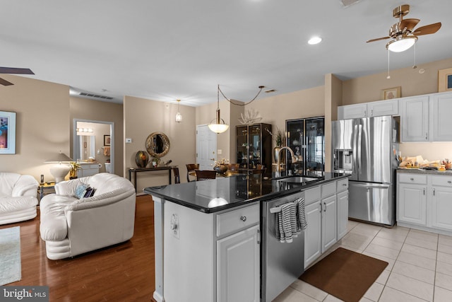 4208 Knox Ct Unit 4208, Warwick, PA 18974 - kitchen featuring stainless steel appliances, a sink, ceiling fan, open floor plan, and white cabinetry