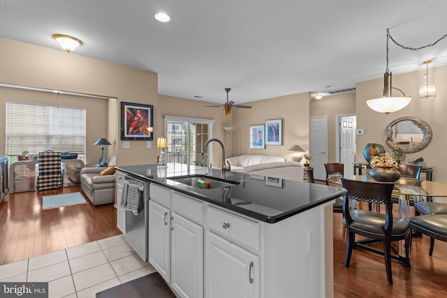 4208 Knox Ct Unit 4208, Warwick, PA 18974 - kitchen with open floor plan, a sink, dishwasher, and dark countertops