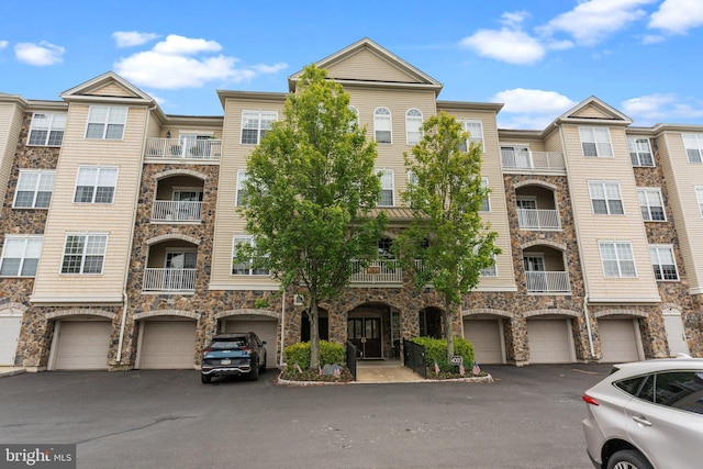 4208 Knox Ct Unit 4208, Warwick, PA 18974 - view of apartment building / complex featuring a garage and driveway