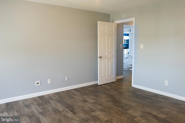 1000 Country Club Rd Unit 8, York, PA 17403 - spare room featuring dark wood-style floors and baseboards