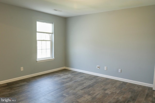 1000 Country Club Rd Unit 8, York, PA 17403 - spare room featuring dark wood-style flooring and baseboards