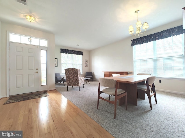 1513 Turtle Creek Ln, Quakertown, PA 18951 - dining space with a chandelier, baseboards, and light wood-style floors