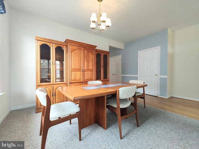 1513 Turtle Creek Ln, Quakertown, PA 18951 - dining area with a chandelier, baseboards, and light wood-style flooring