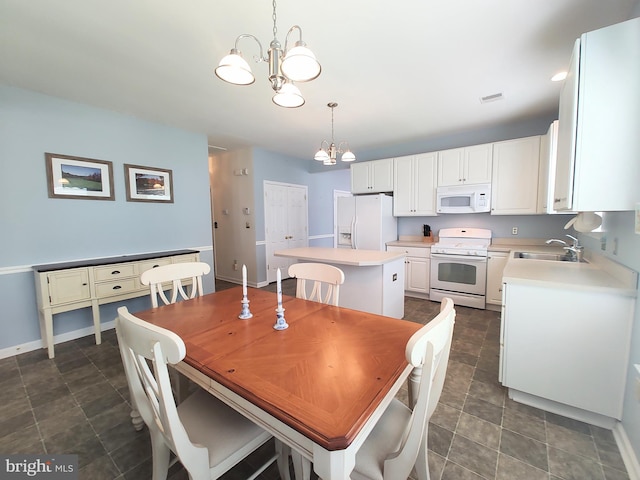 1513 Turtle Creek Ln, Quakertown, PA 18951 - dining room with a chandelier, baseboards, and stone finish flooring