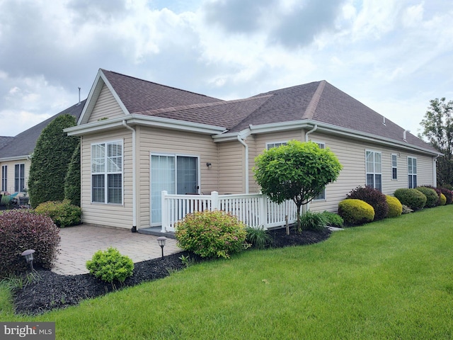 1513 Turtle Creek Ln, Quakertown, PA 18951 - view of home's exterior with a yard, a patio area, a shingled roof, and a deck