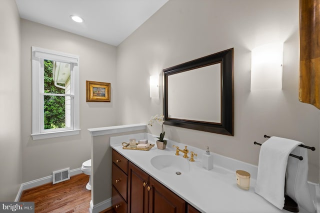 704 Turnbridge Rd, Wayne, PA 19087 - bathroom with vanity, baseboards, toilet, and wood finished floors