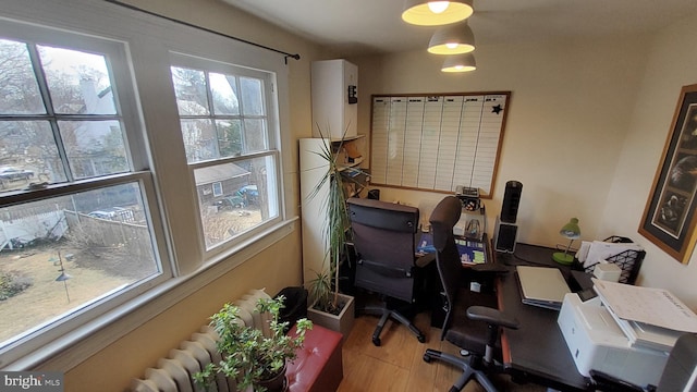5463 Nebraska Ave NW, Washington, DC 20015 - office area with wood finished floors and water heater